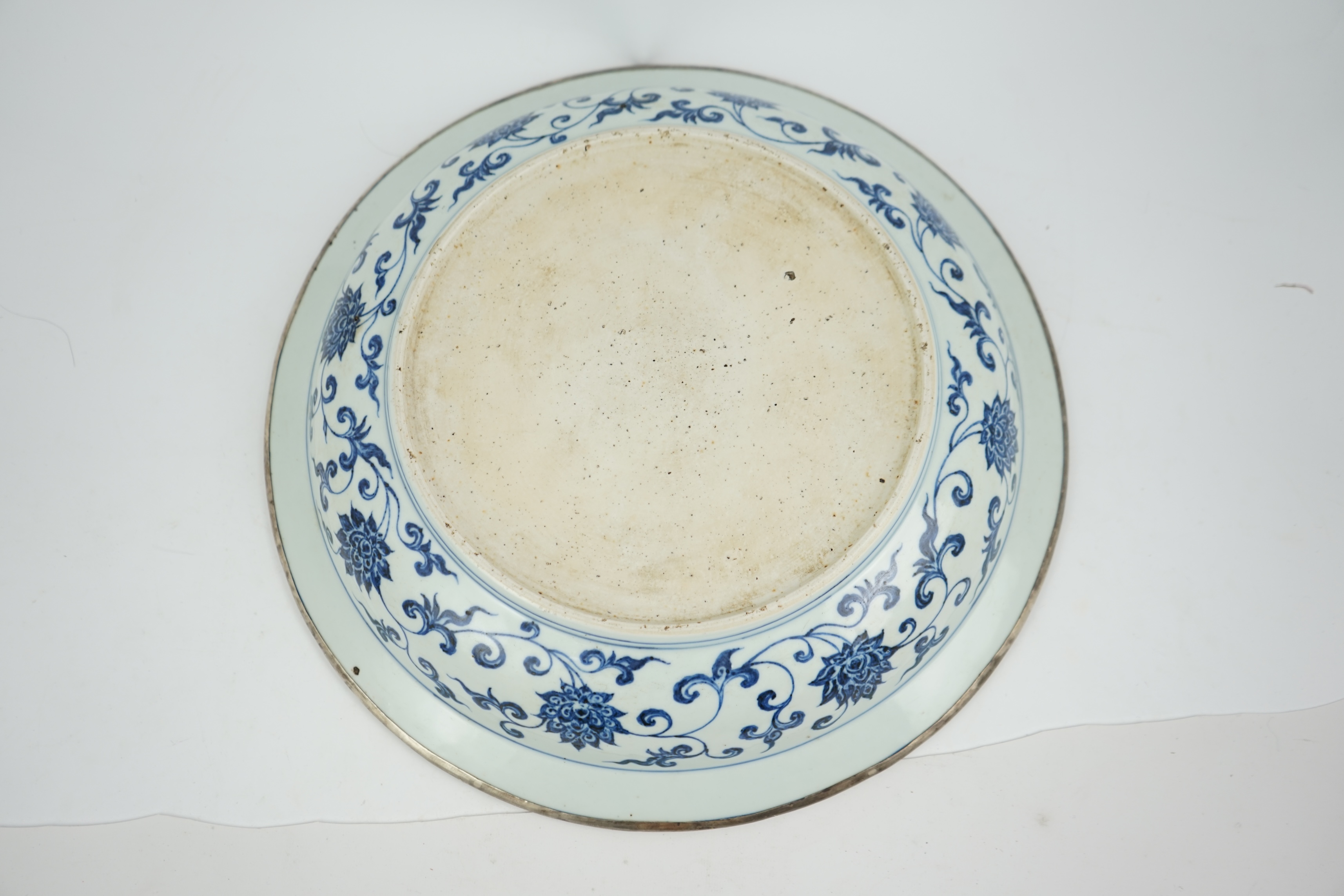 A large Chinese Ming style blue and white dish, possibly 18th century